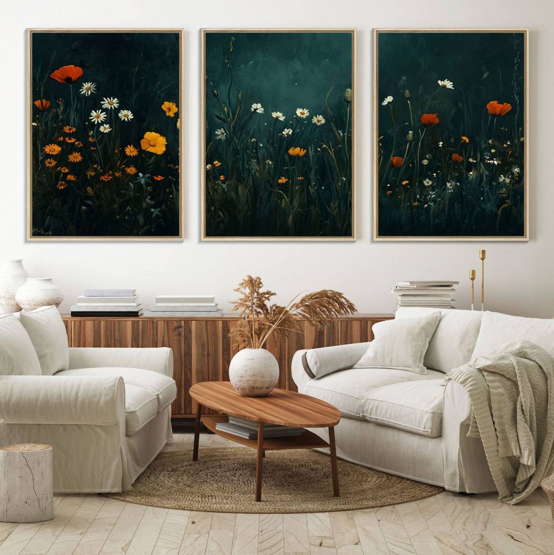 The cozy living room exudes vintage charm with three pieces of Framed Wildflower Field Wall Art on a green wall.