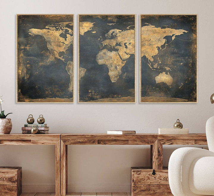 The Grunge World Map Canvas Wall Art features golden tones and is displayed against a white-paneled wall.