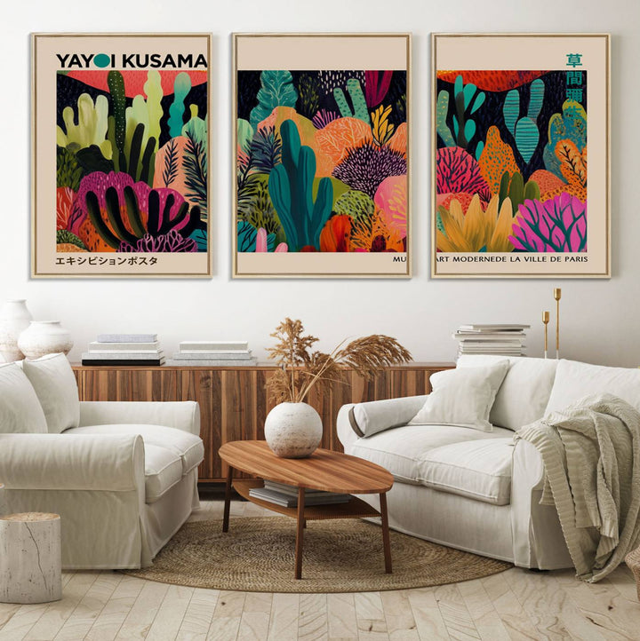 The vibrant canvas print of wall art features abstract plants, with the elegant text "Yayoi Kusama Wall Art Canvas Print" displayed on the colorful frame.