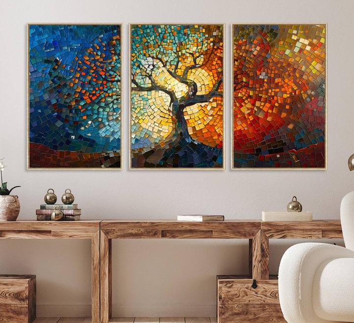 Mosaic Tree Canvas Wall Art: A stunning stained glass-inspired Tree of Life featuring blue and orange swirling patterns reminiscent of a sunburst.