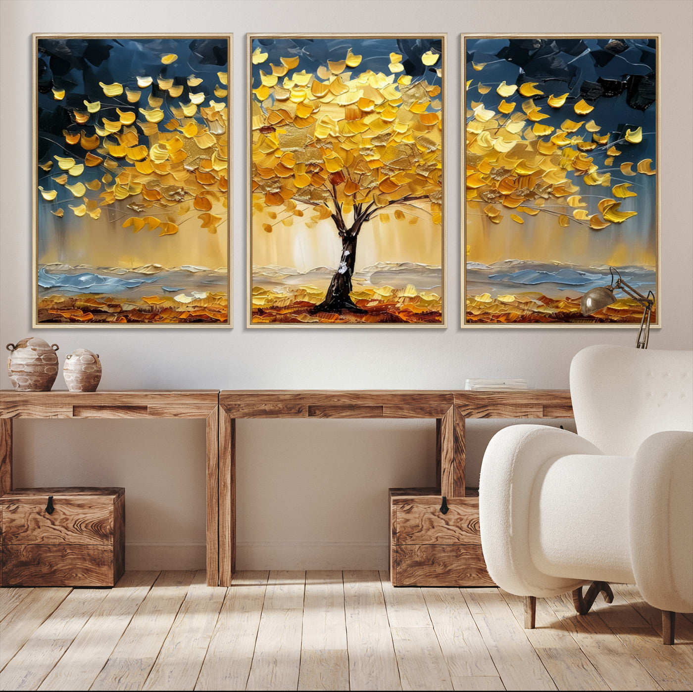 Canvas of a golden autumn tree with textured brushstrokes and moody blue skies, perfect for dramatic and vibrant home decor.
