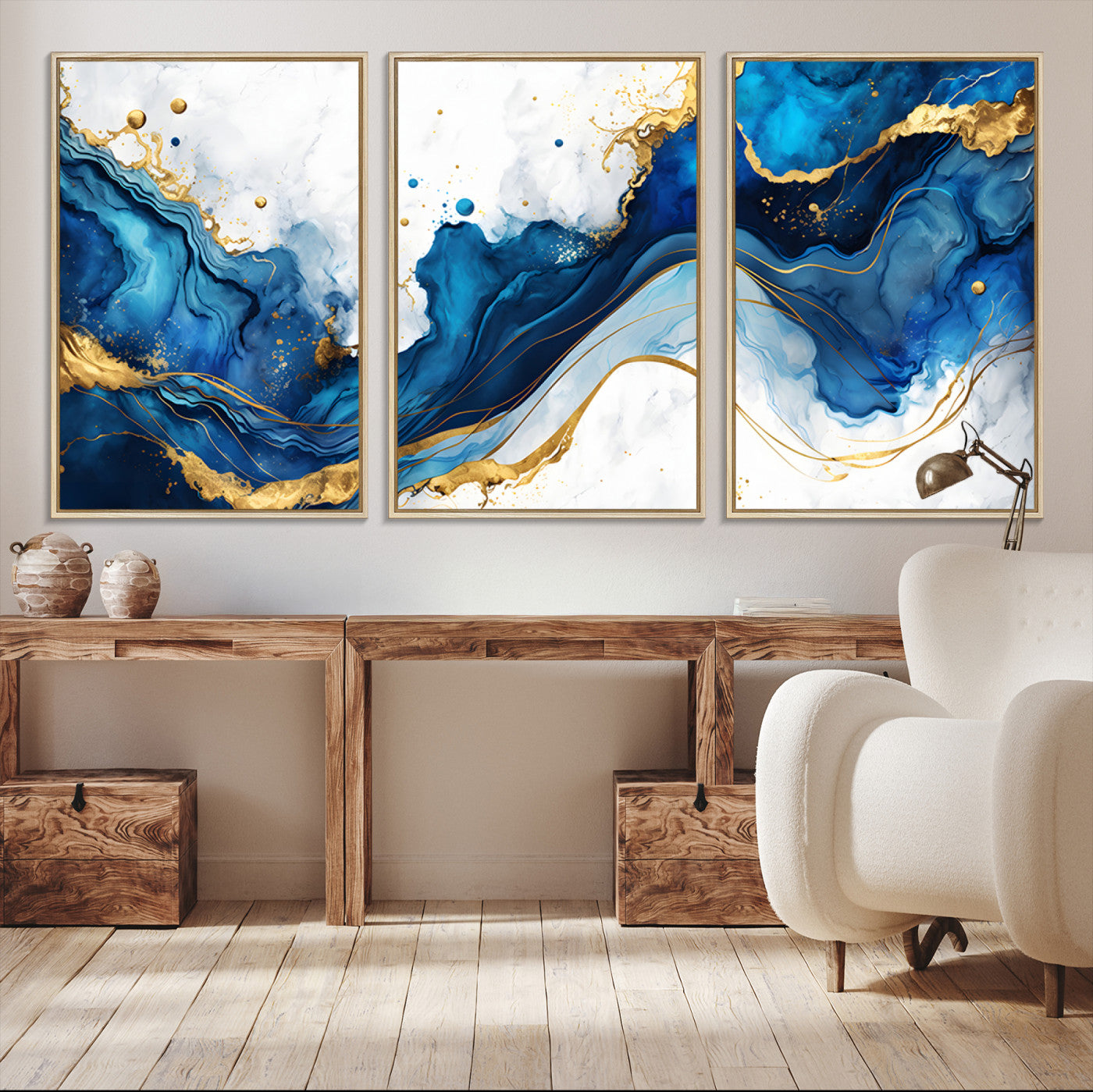 Elegant abstract canvas in cobalt blue and gold tones, featuring marble waves and fluid motion, ideal for luxe interior styling.