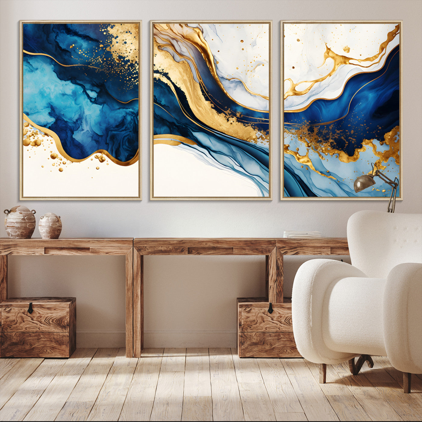 Canvas artwork with fluid blue and gold marbling, perfect for modern luxe or elegant abstract home decor styles.