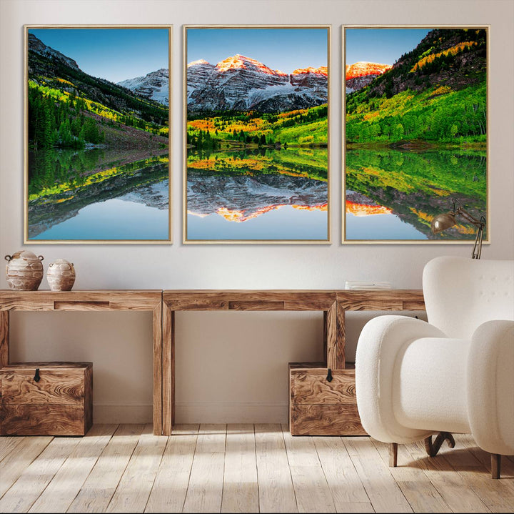 The Sunrise Maroon Bells Lake Wall Art Print beautifully captures North Maroon Peak mirrored in the tranquil lake, framed by lush greenery.