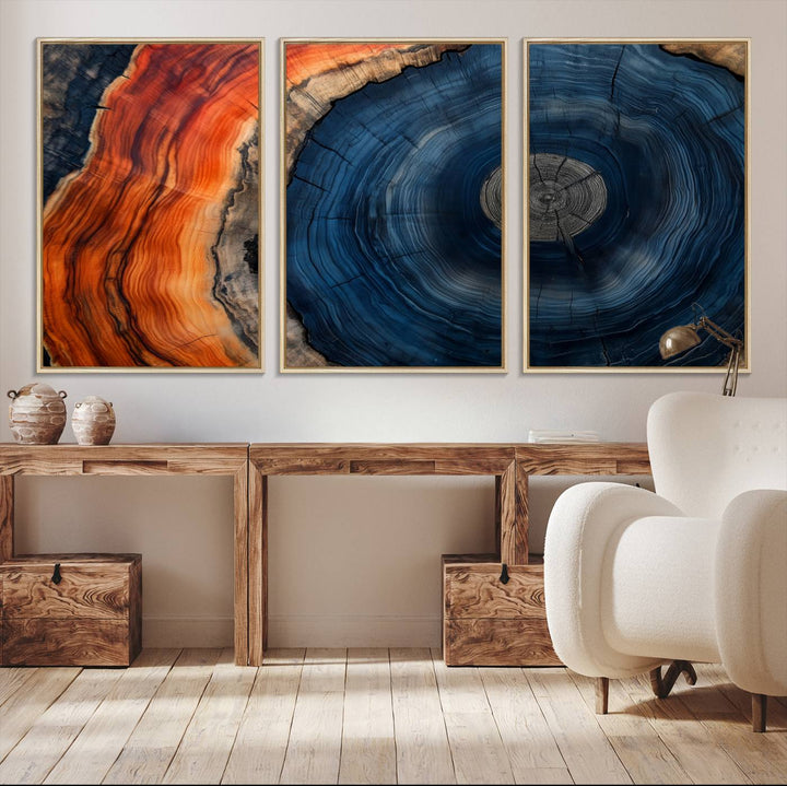 Abstract Tree Ring Wall Art Print on canvas featuring vibrant blue, orange, and brown rings with a natural rustic wood texture. Free shipping available!.