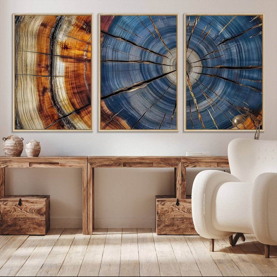 Close-up of blue, brown, and orange wood grain rings on the Abstract Tree Rings Canvas Wall Art Print.