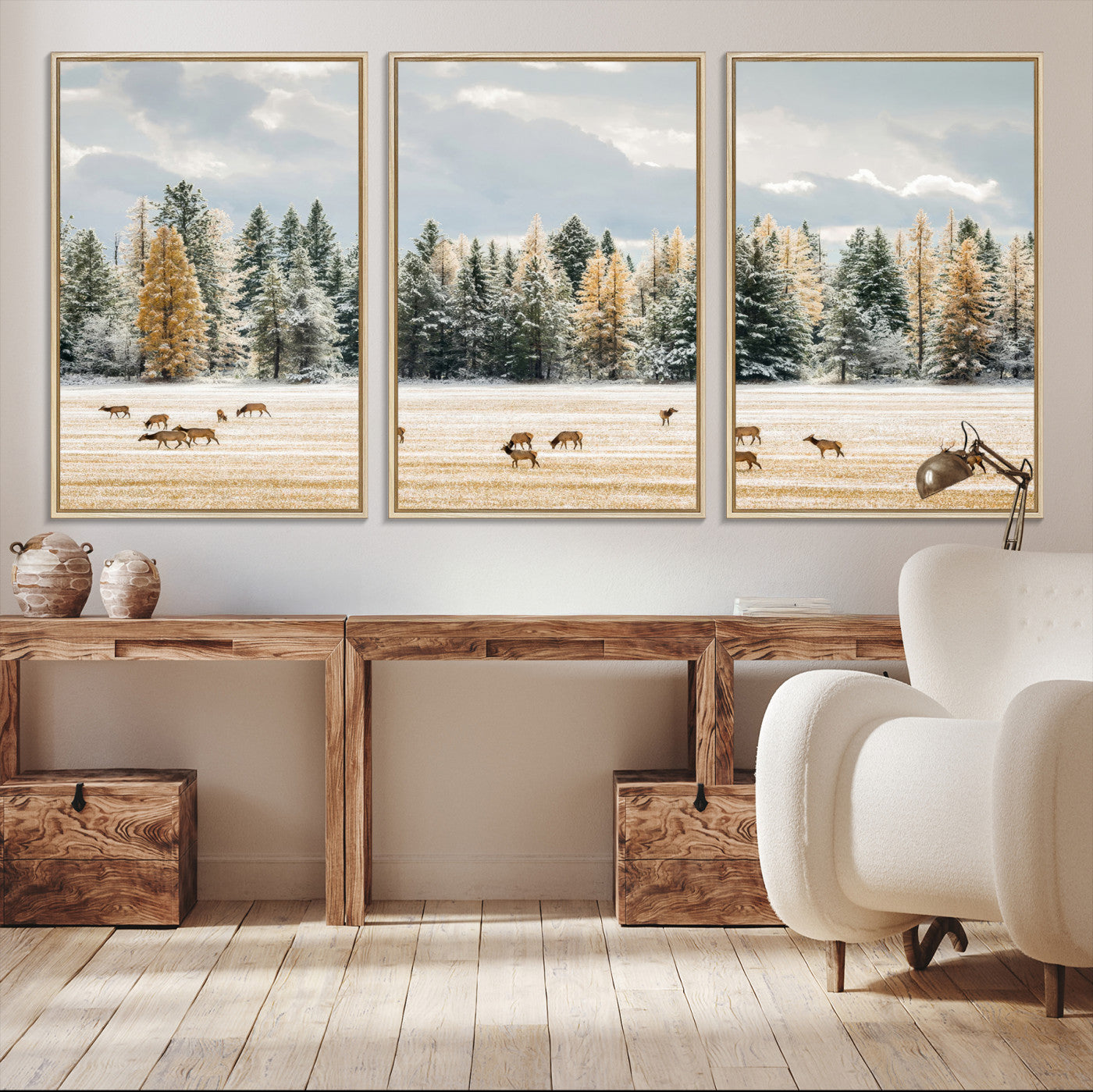 Elk herd in a snowy field with golden pine trees and frosted evergreens, ideal for neutral rustic or cabin-style home decor.