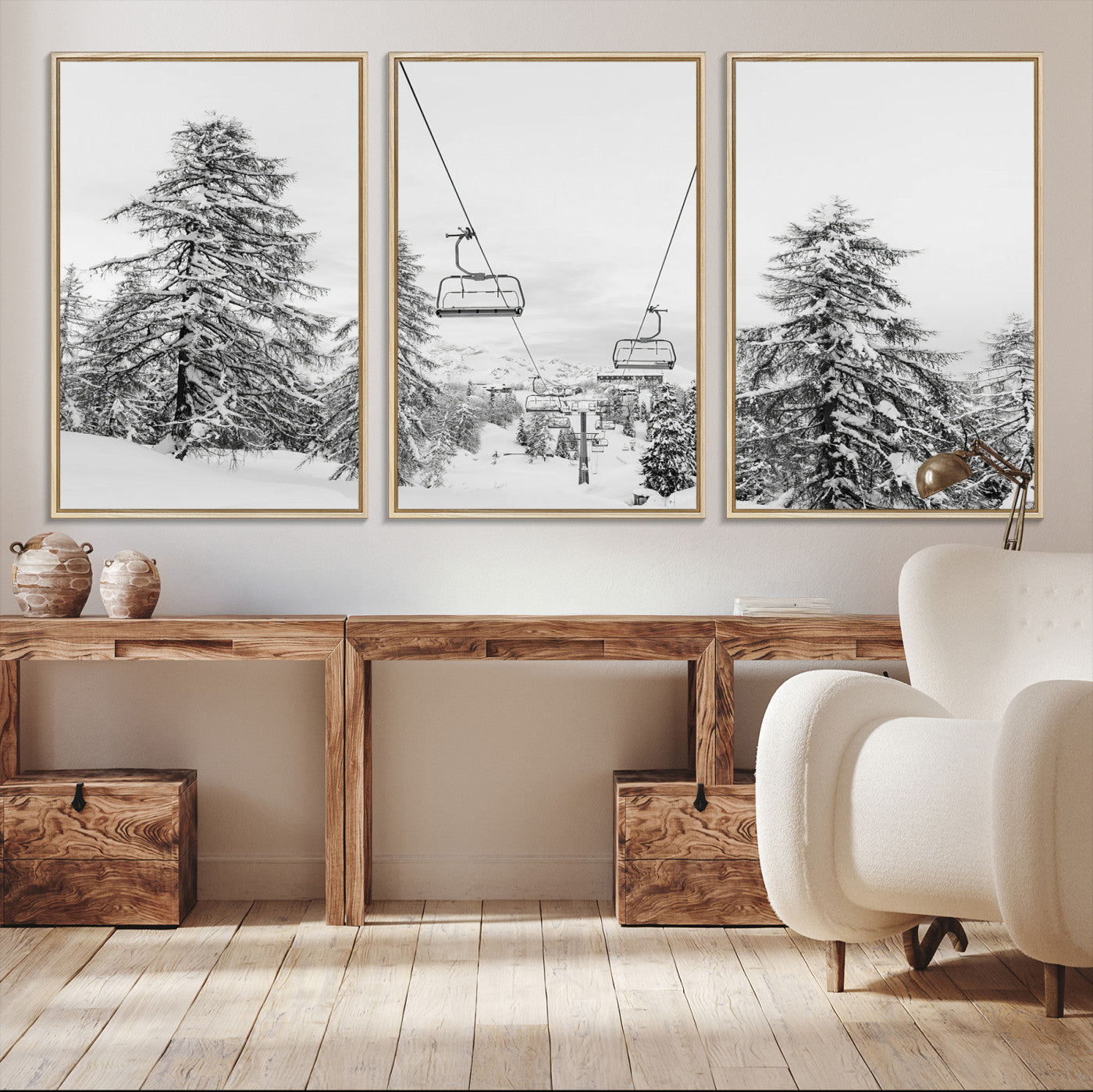 Black and white image of a ski lift amidst snow-covered pine trees, ideal for winter mountain or cabin-themed decor.