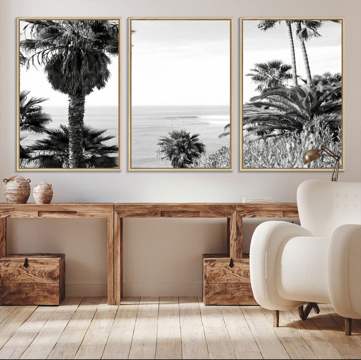 Monochrome canvas of palm trees framing a coastal surf scene, perfect for California-inspired or retro black-and-white beach decor.