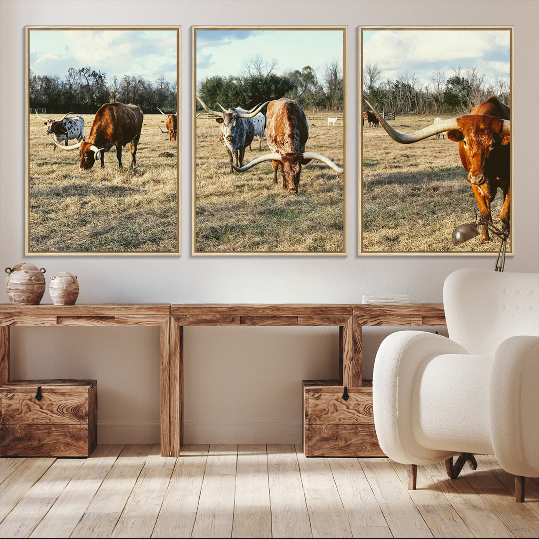 A herd of Texas Longhorn cattle grazing in an open field under a partly cloudy sky, capturing a rustic and Western ranch aesthetic.