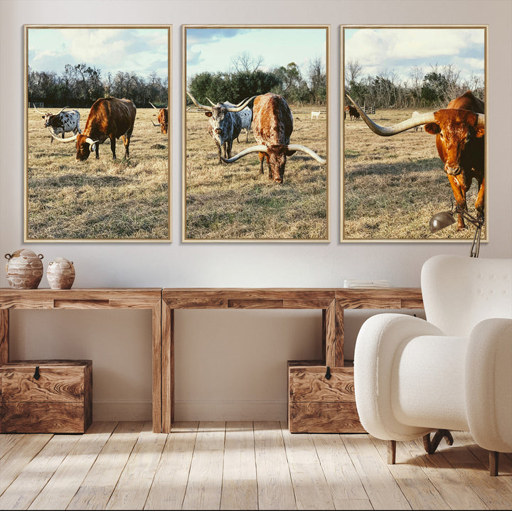 A herd of Texas Longhorn cattle grazing in an open field under a partly cloudy sky, capturing a rustic and Western ranch aesthetic.