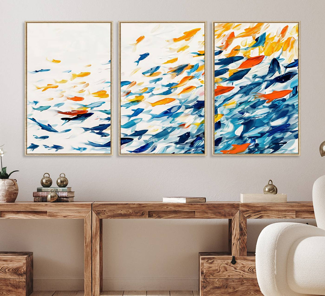 A colorful Abstract Fish Shoal Canvas Print hangs on the wall.