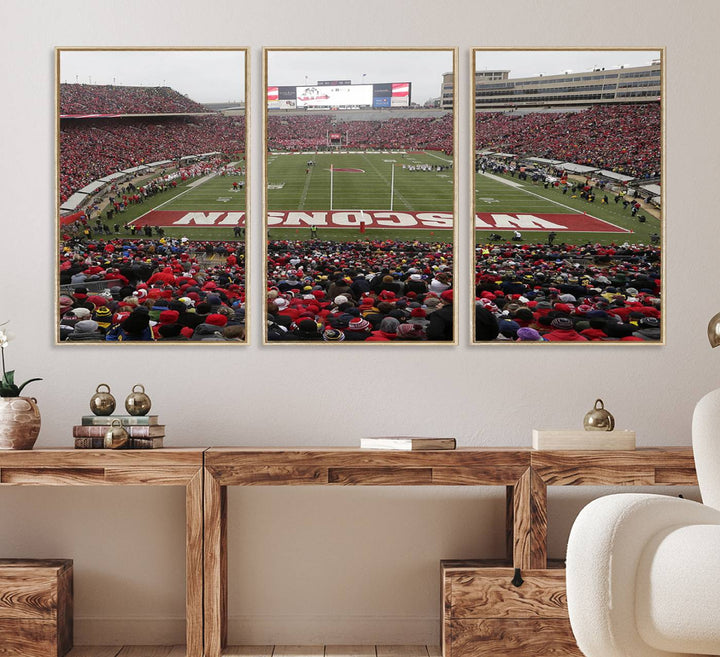 The wall art depicts WISCONSIN in red and white, similar to Wisconsin Badgers Football Canvas Art.