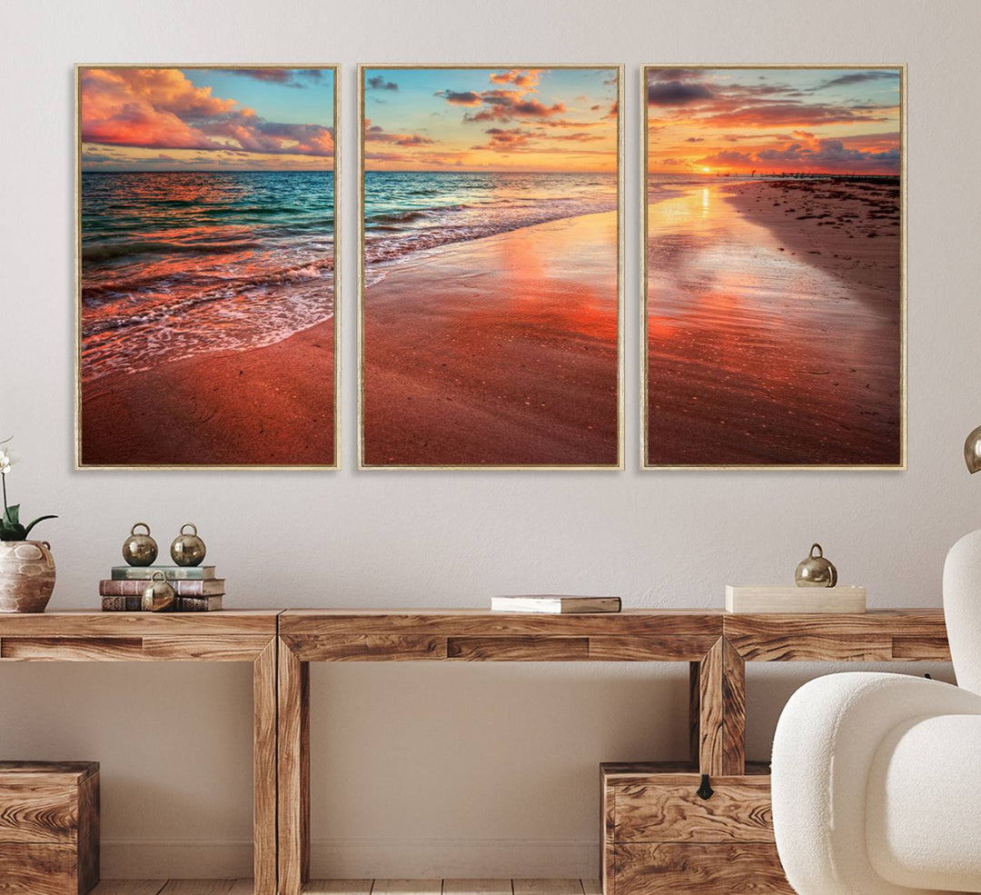 An Ocean Canvas Print depicts a sunset over a beach with reflections.