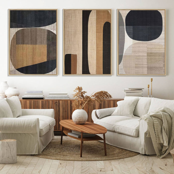 A stylish living room exuding modern elegance features the Abstract Minimalist Canvas Wall Art in a neutral geometric design.