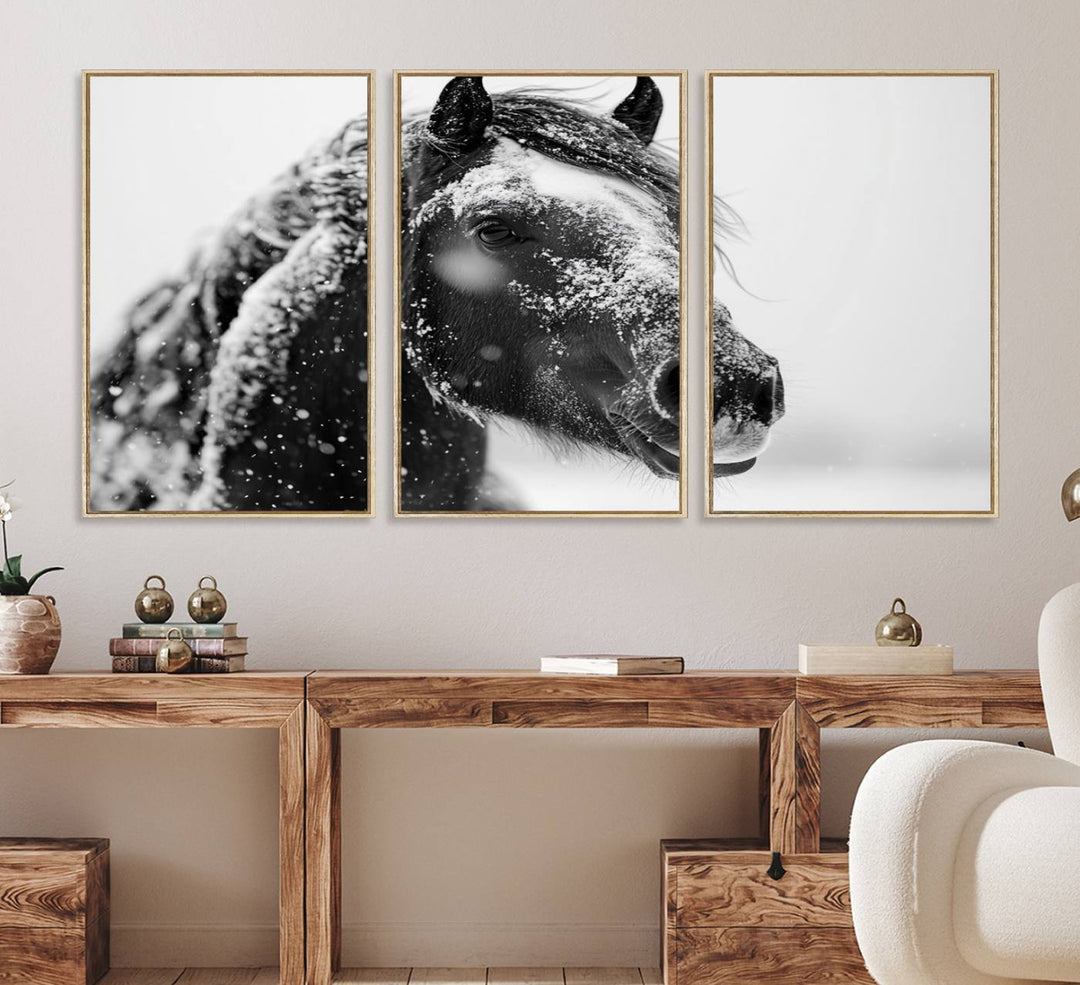 A large 3-panel rustic farmhouse wall art showcases a black and white winter horse canvas print against a snowy backdrop.