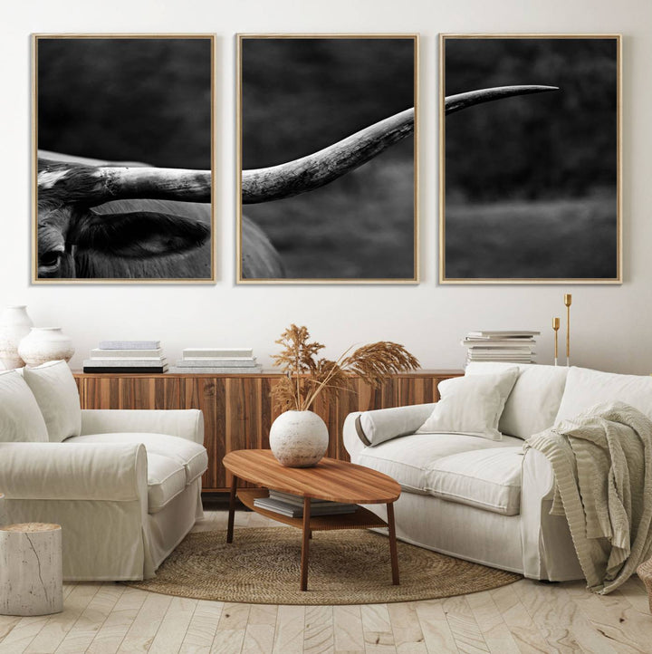 Cow Longhorn Wall Art: This black and white print adds rustic charm.