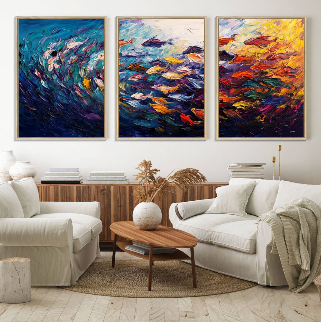 The Vibrant Abstract Fish Swarm Art features a colorful 3-piece canvas that adds a pop of color.