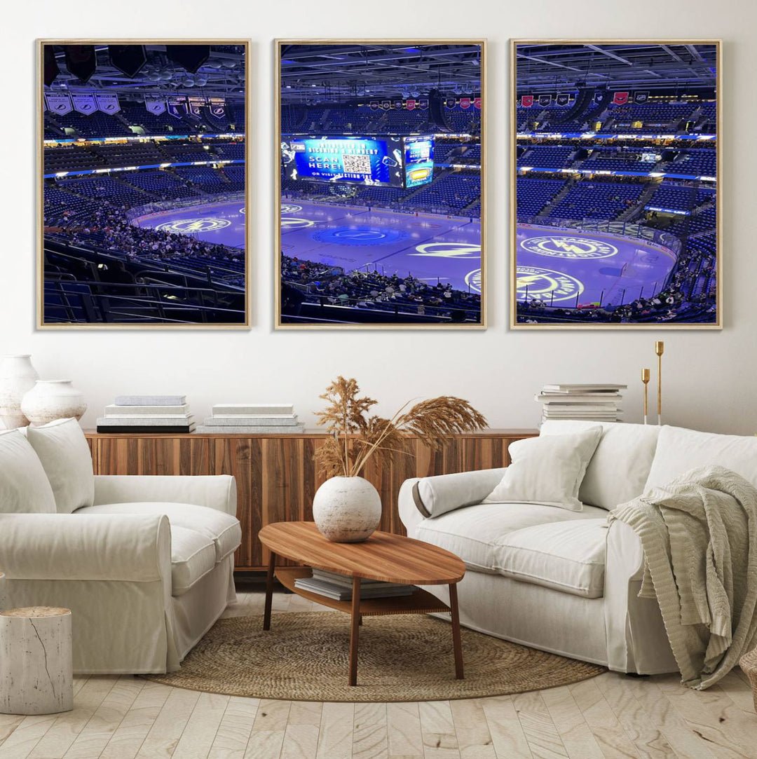 The wall art canvas print at Amalie Arena features team logos on ice, encapsulating the vibrant atmosphere of an NHL hockey stadium.