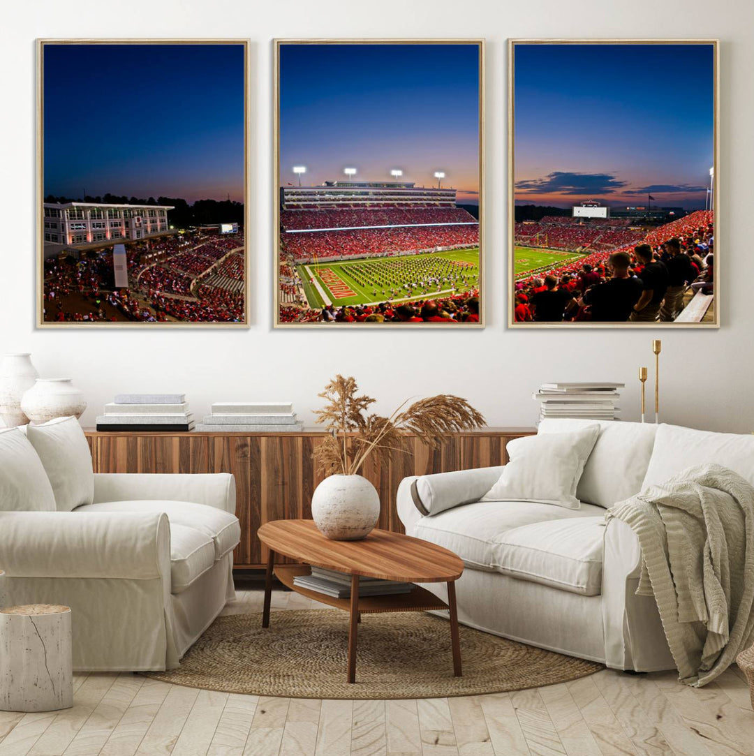 The Wolfpack Football Team Print captures a band and crowd at dusk in a premium canvas art style at Raleigh Carter-Finley Stadium.