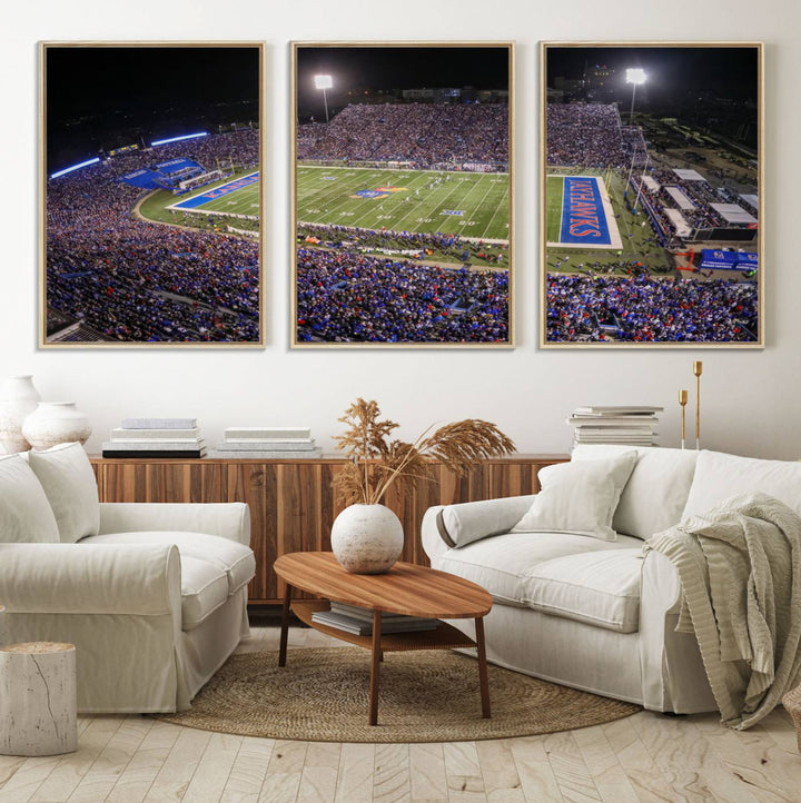 A canvas depicting an aerial view of the University of Kansas Memorial Stadium, showcasing bright lights and a lush green field at night.