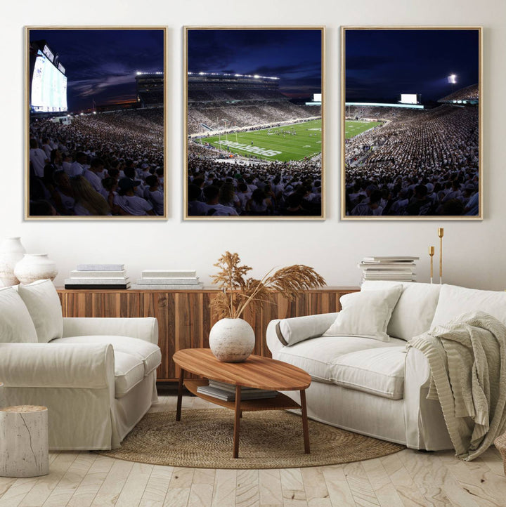 A packed football stadium at night, with bright lights and fans in white, depicted in a Michigan State Spartans Stadium wall art.