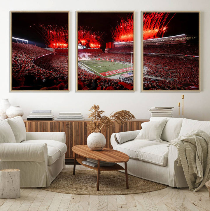 A vibrant red canvas art of a packed Ohio State Buckeyes stadium at night with fireworks.