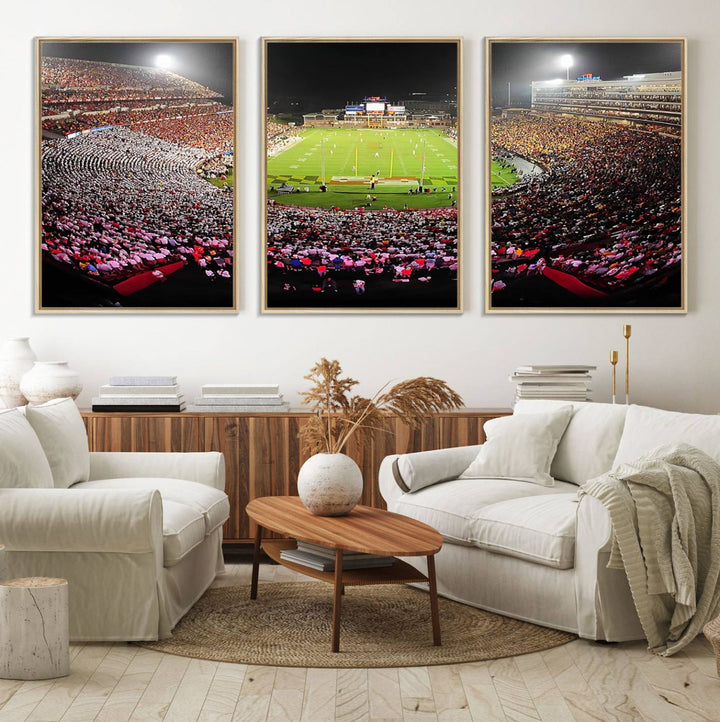 The Maryland Terrapins Football Wall Art Canvas showcases a packed SECU Stadium at night with a bright field and cheering fans.