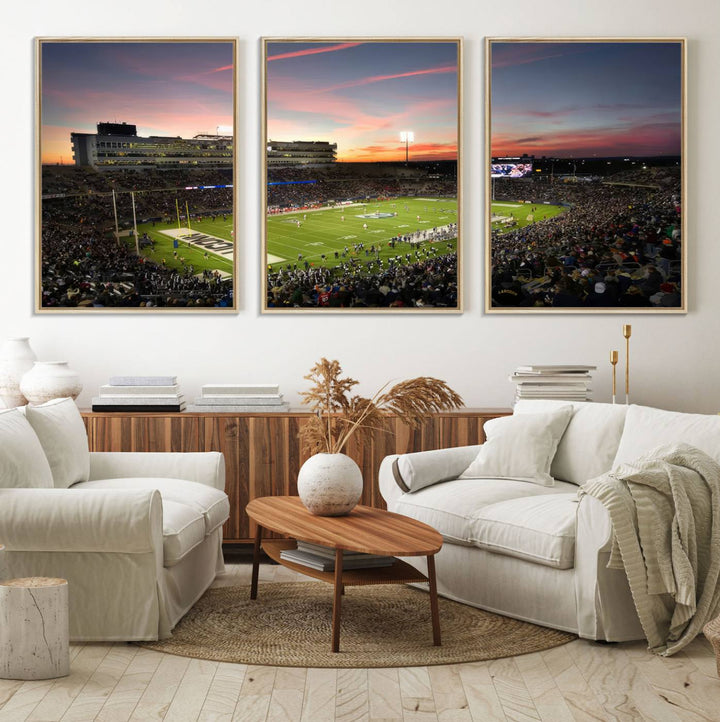 This wall art canvas print captures UCONN Huskies fans energizing a sunset scene at East Hartfords Pratt & Whitney Stadium.