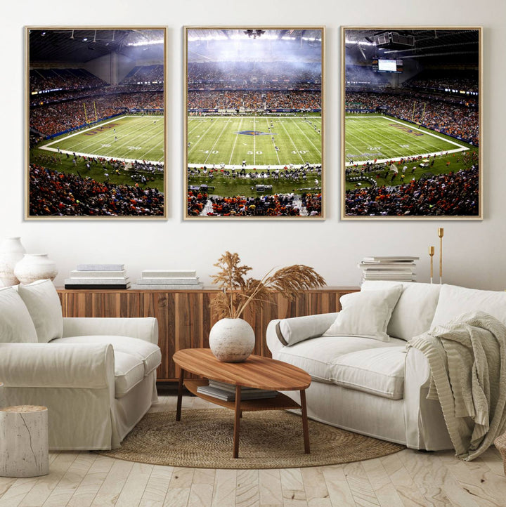 The modern living room features an Alamodome wall art canvas print, depicting a stadium filled with spectators for a UTSA Roadrunners game.