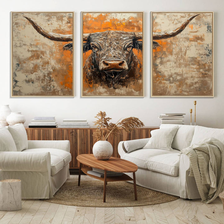 Abstract Cow Longhorn Bull Wall Art presents a detailed face centered on a textured orange and beige background.