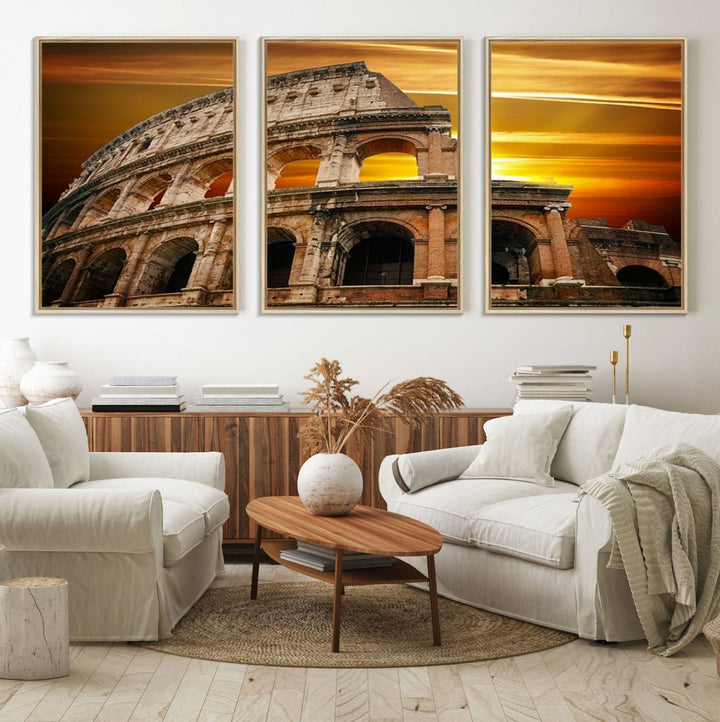 On the wall, theres a piece of art titled Colosseum with Yellow Sunset Behind, Italy.