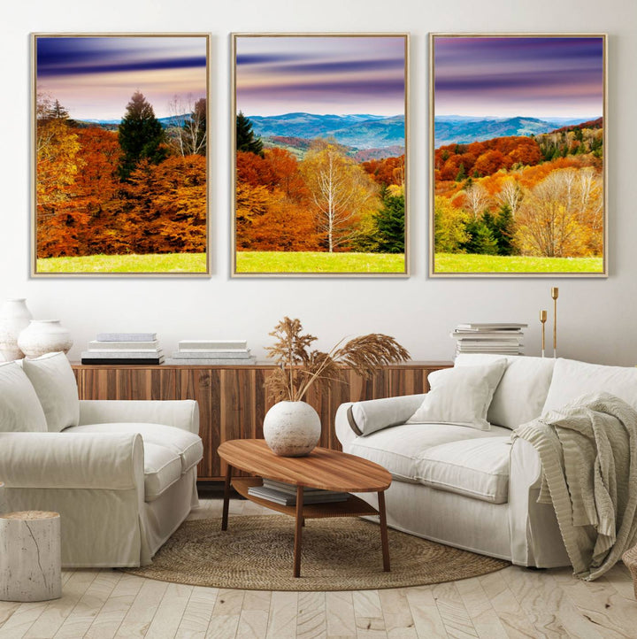 The wall art in the kitchen dining area is a large Autumn Forest Mountain Canvas Print that captures a vivid scenic landscape.
