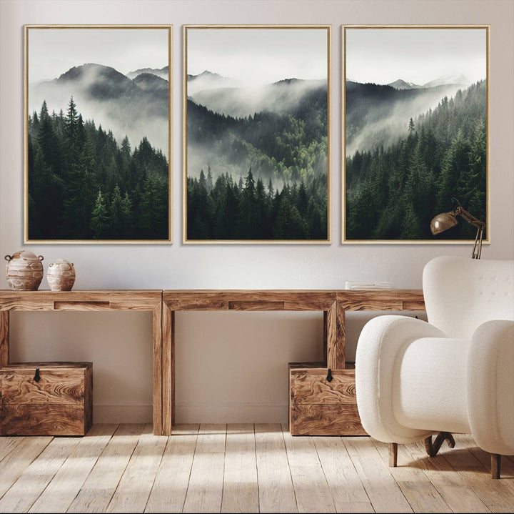 The Misty Forest Canvas Print Wall Art captures a serene misty forest scene with fog and mountains.