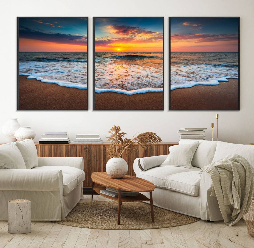 A Sunset with Calm Waves on the Beach Wall Art Canvas Print adorns the dining room.