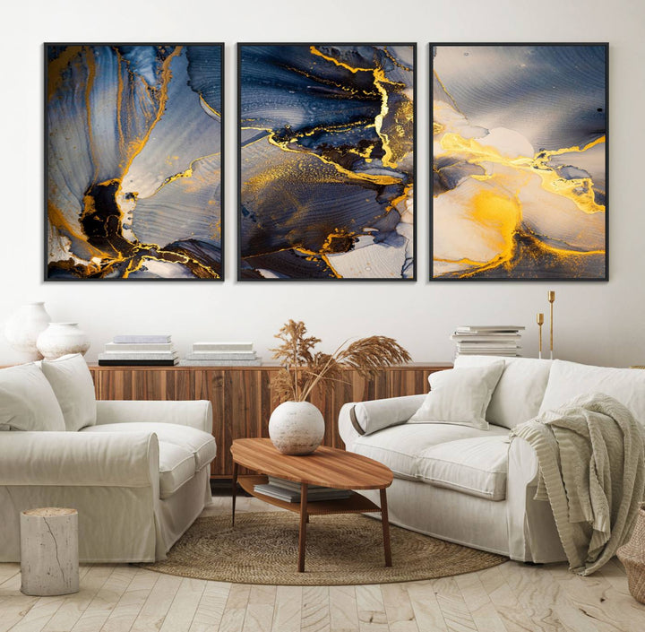 A modern luxury kitchen features a large gold and blue abstract canvas wall art print.