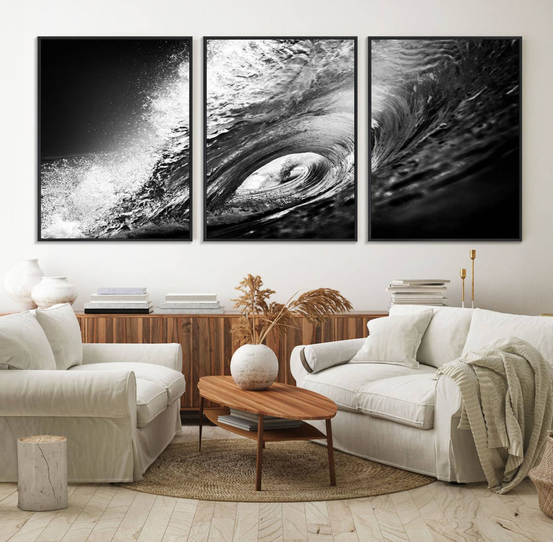 The Black Ocean Wave at Sunset Canvas Art hangs on a grey wooden wall.