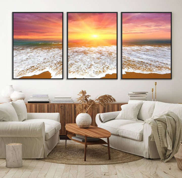 Golden Beach Sunrise 3-panel canvas art of ocean waves, hung on a wooden wall.