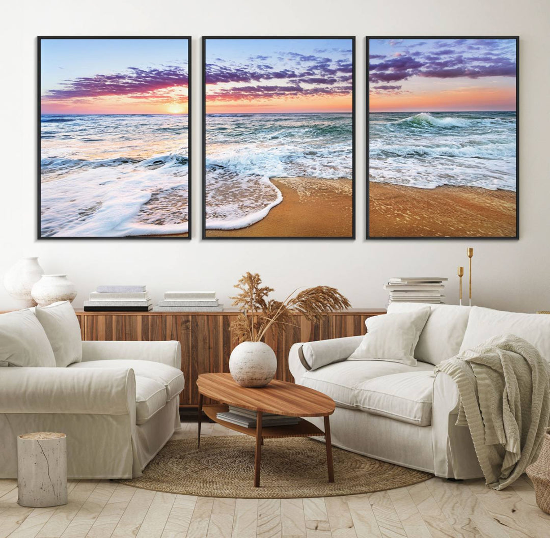 The Vivid Sunset Ocean Waves Triptych hangs on a wooden wall.