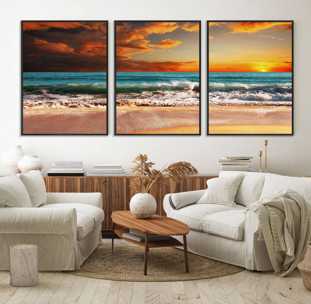 A Golden Sunset Beach triptych seascape canvas hangs on the wall.