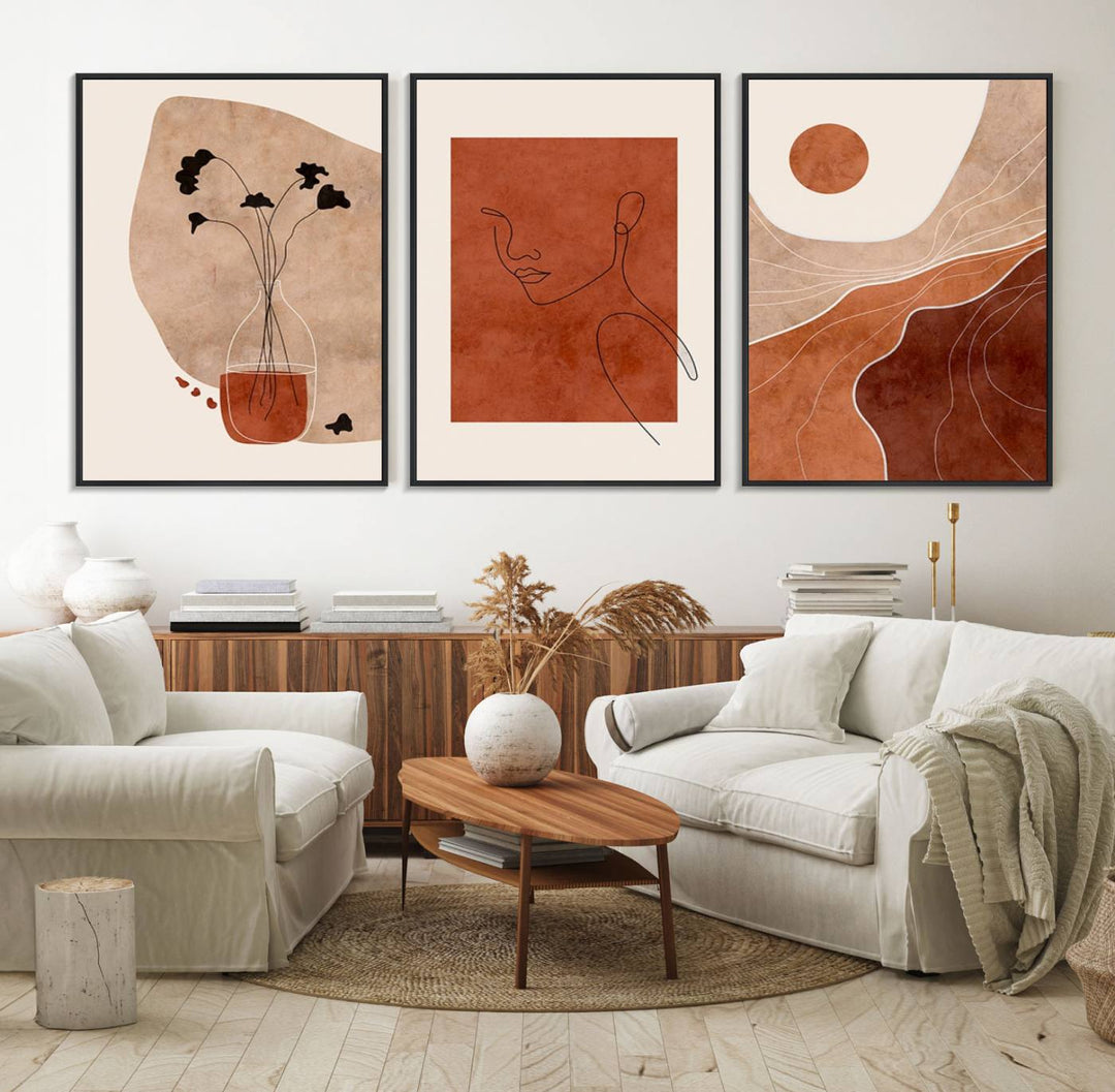 A giclée canvas triptych showcases minimalist mountain landscapes in earthy tones.