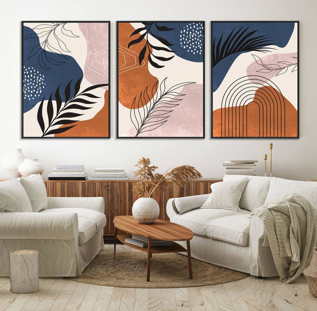 Boho Wall Art Canvas Print Set showcases mid-century geometric and leaf motifs in blue, ochre, and pink.