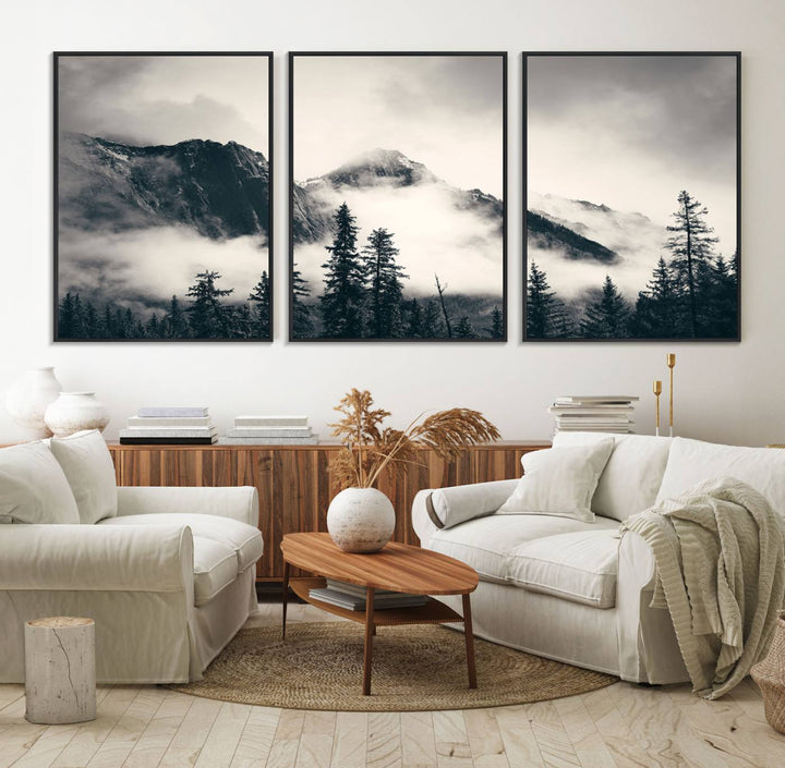 A large foggy mountain forest canvas print hangs prominently in the room.