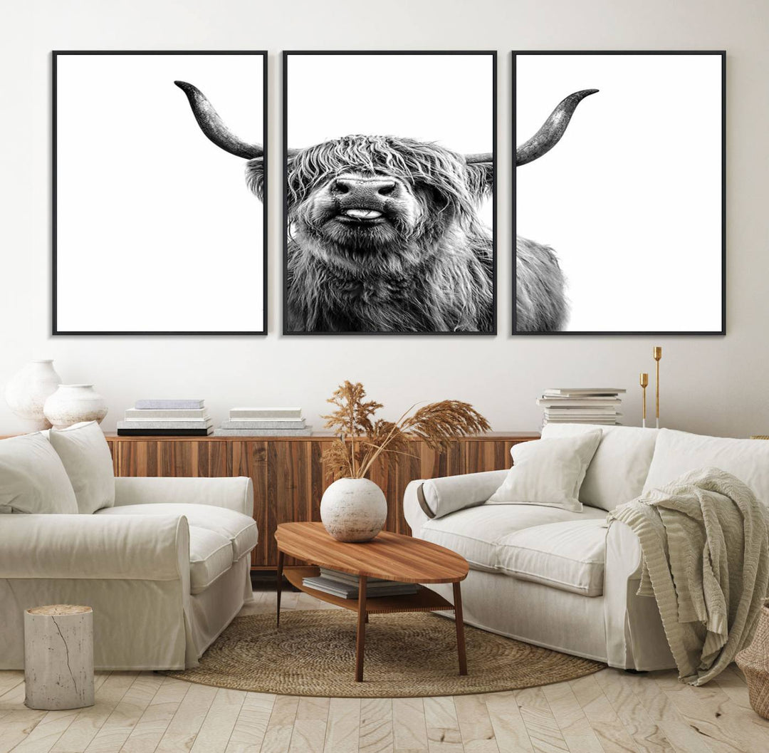 The Fanny Highland Cow art print decorates the modern kitchen, featured in black and white.