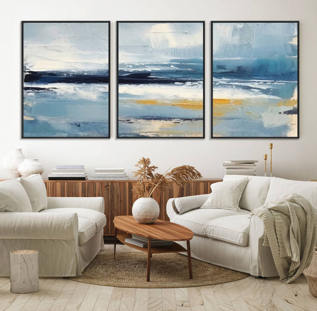 The Abstract Ocean Canvas Wall Art in coastal blue and gold enhances the modern kitchen.