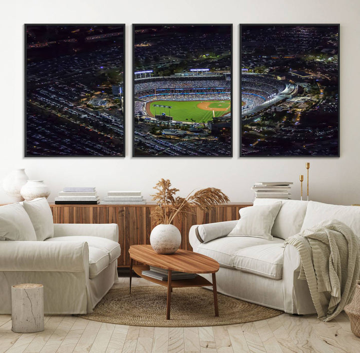 A large Los Angeles Dodgers print of Dodger Stadium at night is displayed near a window.