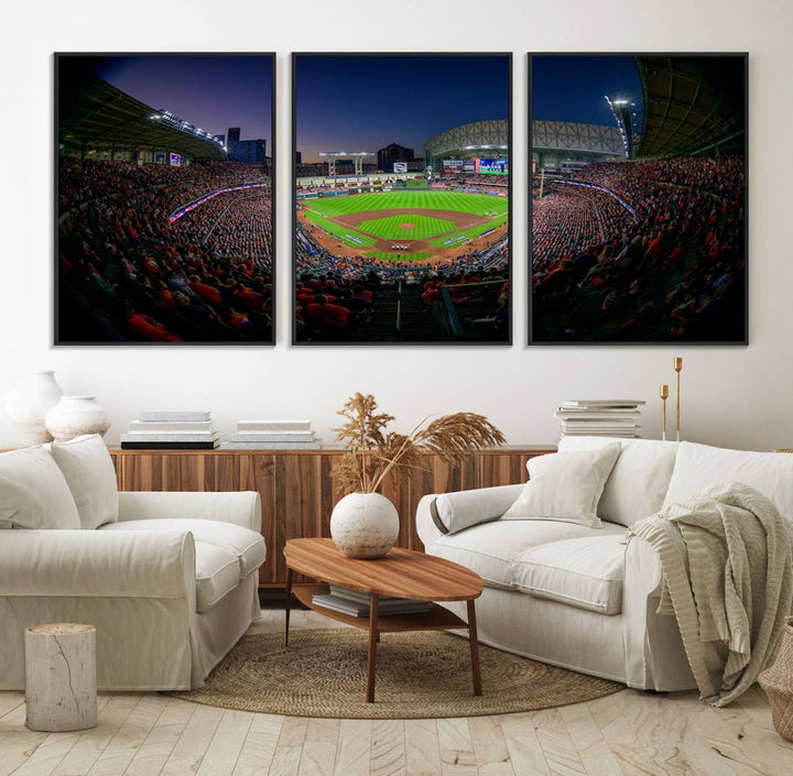 A canvas print of Houston Minute Maid Park at dusk is mounted on the wall.