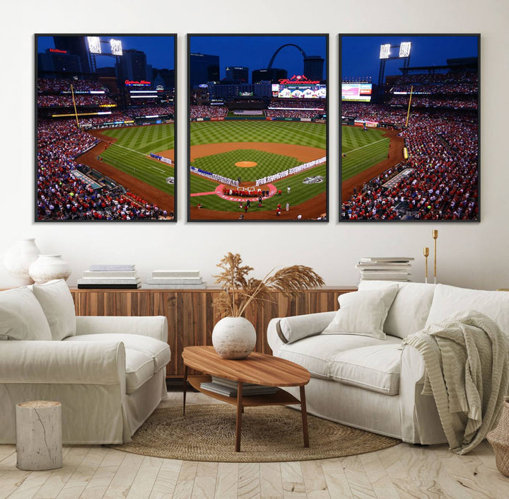 A Cardinals wall art canvas print depicts Busch Stadium with players lined up on the field and a full audience under the lights, capturing the vibrant atmosphere.