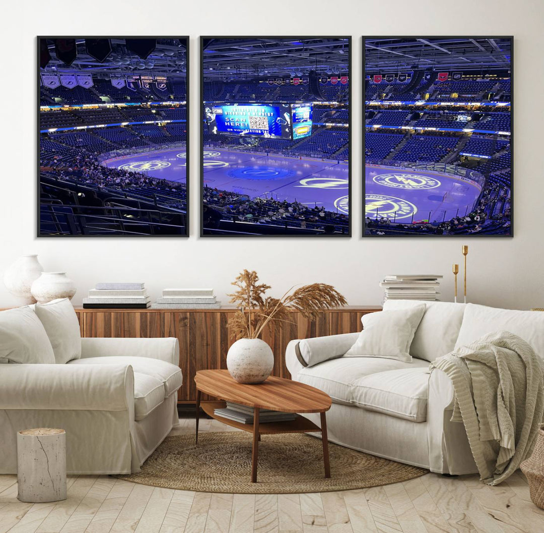 The wall art canvas print at Amalie Arena features team logos on ice, encapsulating the vibrant atmosphere of an NHL hockey stadium.