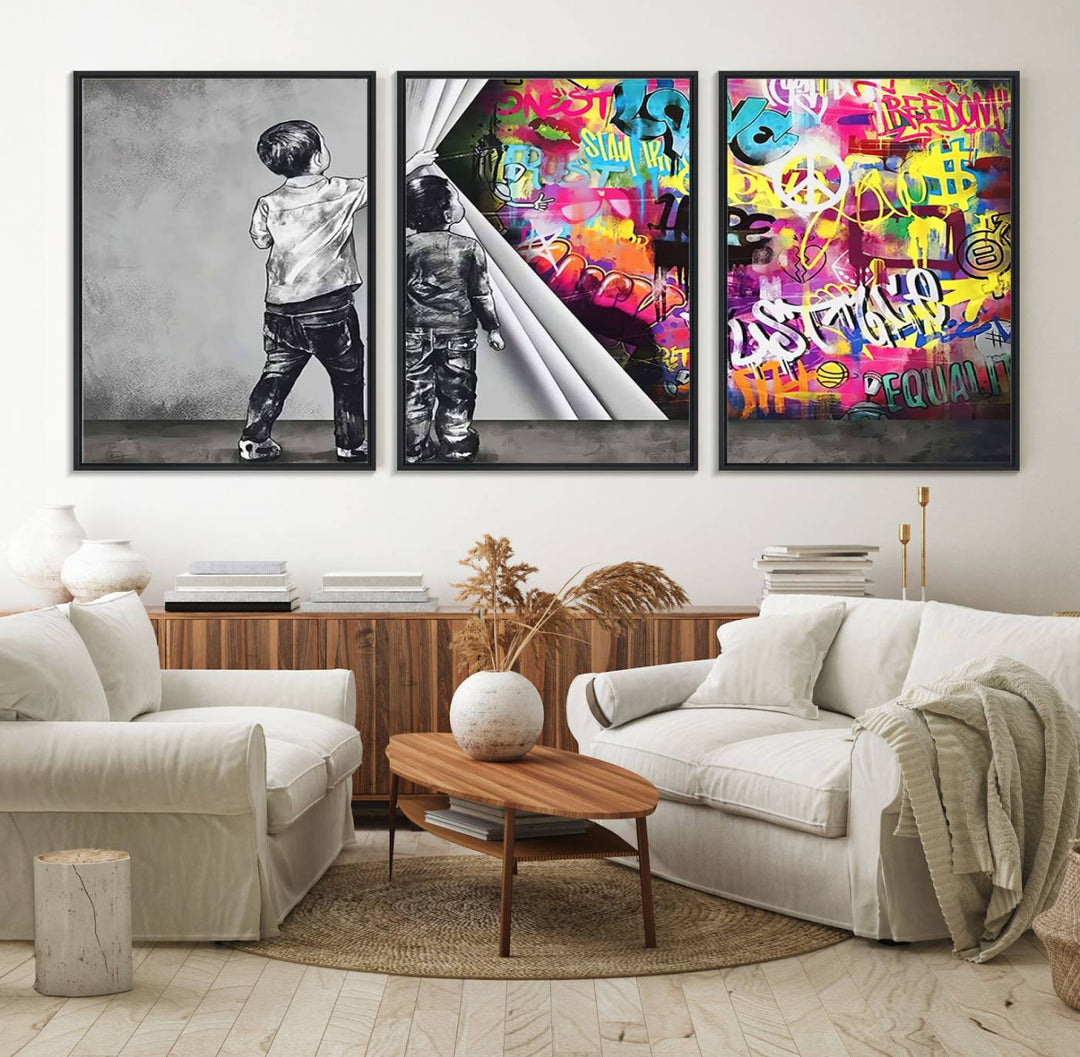 The Banksy Print - Street Art Canvas features a vibrant and bold image of two children lifting a curtain to reveal colorful graffiti. It's ready to hang, adding an urban modern decor vibe.